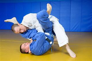 Two Men Practicing Jujitsu