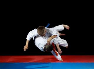 Young Athletes Performing Judo