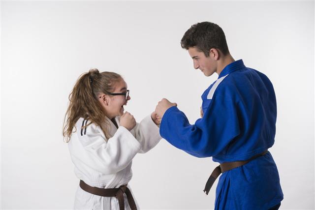 Teenager Judo Fighter Boy And Girl