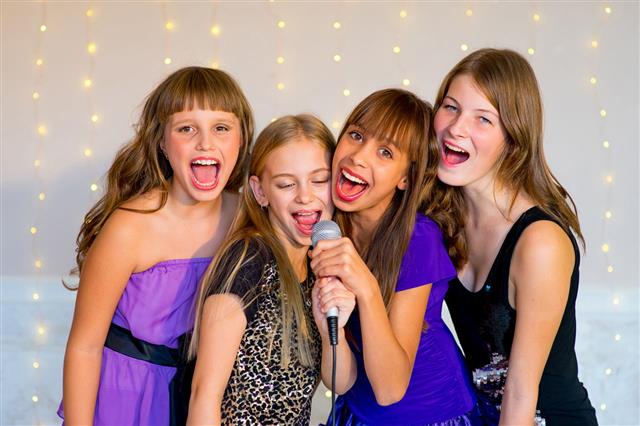 Happy Girls Singing Karaoke