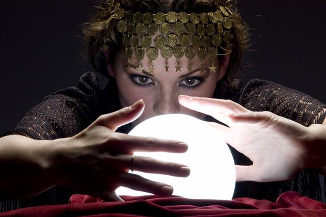 Fortune Teller With Glowing Crystal Ball