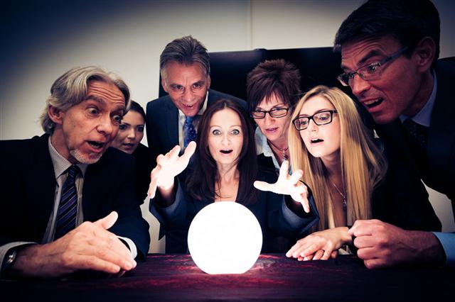 Business Team With Crystal Ball