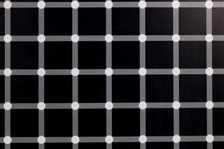 Black Squares And Flashing Dots