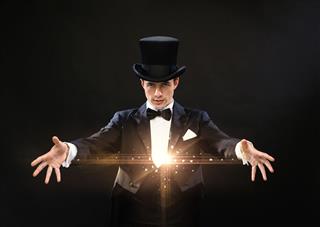 Magician In Top Hat Showing Trick
