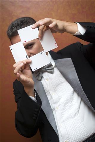 Magician Performing With Cards