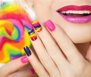 Rainbow manicure and makeup