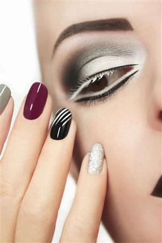 Makeup and manicure in gray
