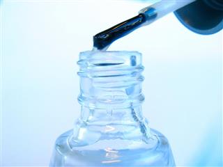 Nail polish brush with bottle