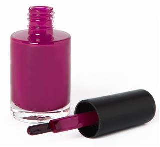 Pink fuchsia open nail polish bottle