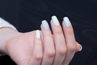 Perfect manicure and natural nails. Attractive modern nail art design