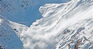 Snow Avalanche In The Mountains