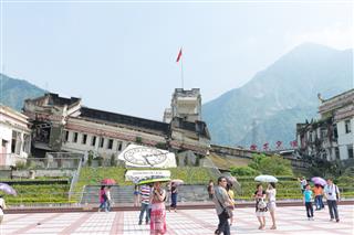 Tourists Visit Monument To Commemorate