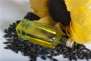 Bottle Of Oil And Sunflower Seeds