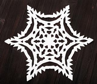 Paper Snowflakes On Table