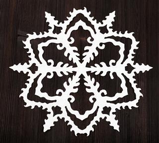 Snowflake Carved From Paper