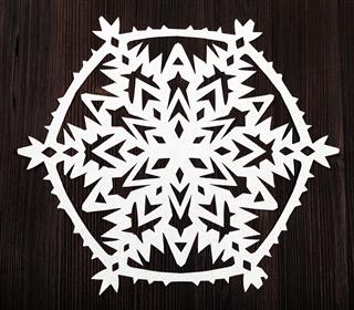 Snowflake Carved From Paper