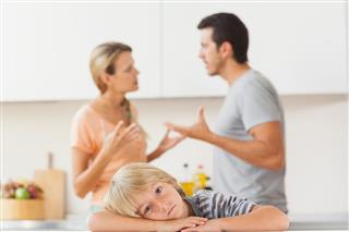 Parents Arguing Child Being Sad