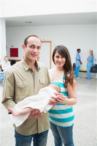 Happy Woman Man With Newborn Baby