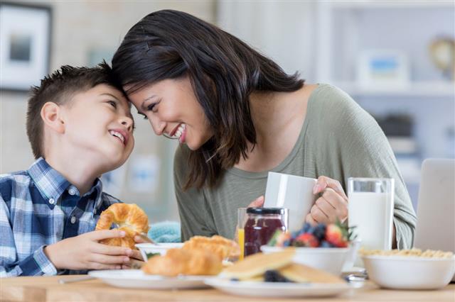Mother Enjoys Breakfast With Son