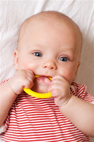 Chewing On Teething Ring