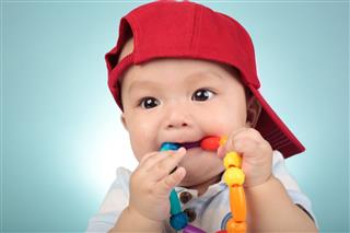 Baby Boy With Teething Toy