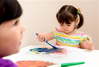 Toddler Girls Painting In Art Class