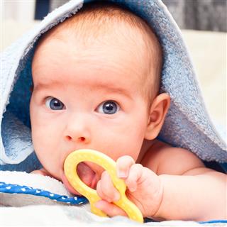 Infant With Teething Toy