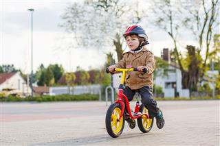 Toddler Boy Riding His Bike