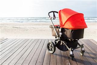 Baby Stroller On The Sea