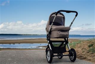 Baby Stroller On Beach