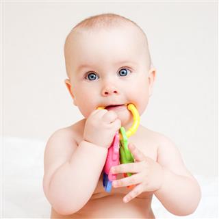 Infant With Teething Toy