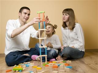 Family Playing With Blocks