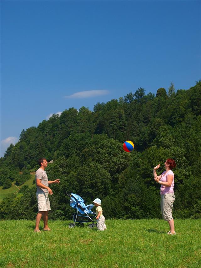 Family Playing In Nature