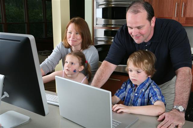 Family Using Computers