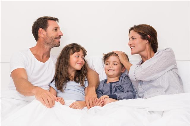 Happy Family on Bed