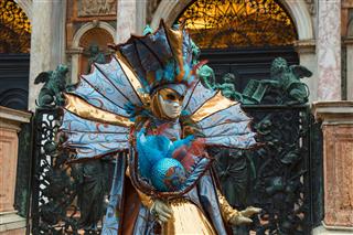 Female Venetian Mask In Elegant Costume