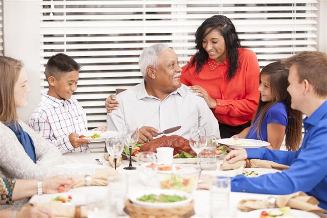 Family Enjoys Thanksgiving Dinner