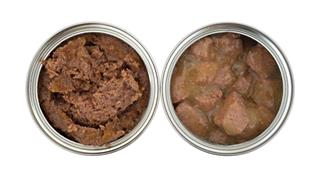 Two Cans Of Opened Dog Food