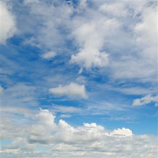 Blue Sky And Cumulus Clouds