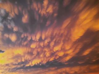 Ominous Colorful Mammatus Storm Clouds Sunset