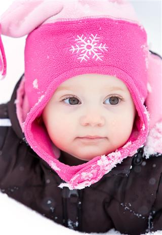 Little Girl In Snow