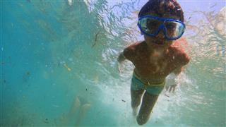 Boy And Snorkeling