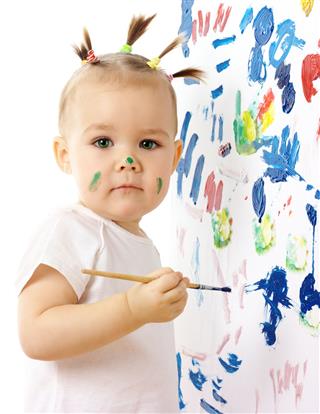 Little Girl Paint On A White Board