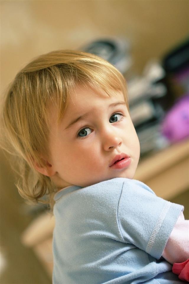Young Toddler Looking Over Shoulder