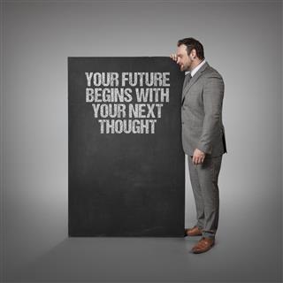 Your future begins with your next thought text on blackboard