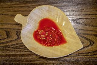 Chili Sauce On Leaf Shape Dish