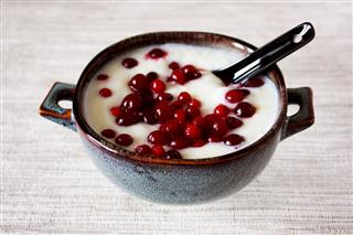 Porridge With Cowberry In A Bowl