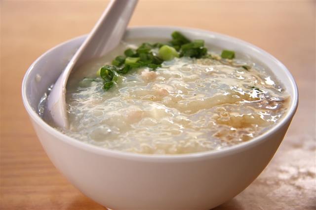 Bowl Of Chinese Porridge With Spoon