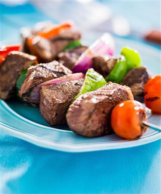 Grilled Beef Shish Kabobs On Table