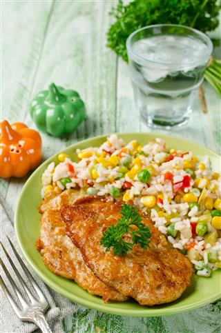 Chicken Chops With Rice And Vegetables